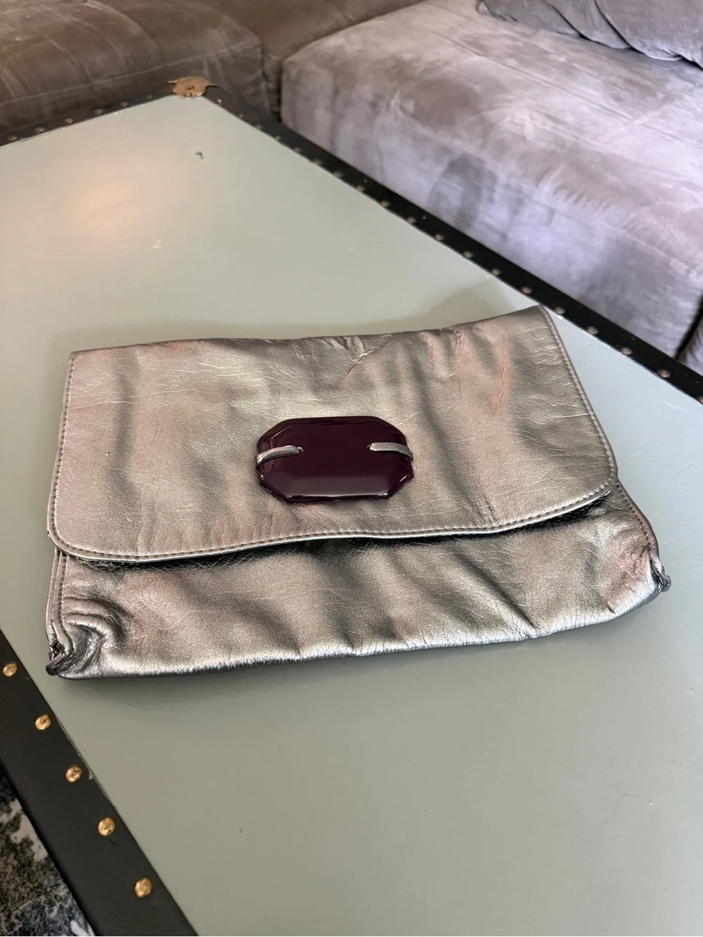 mark. Metallic Silver Fold-Over Clutch with Dark Accent Clasp